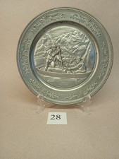 Assiette en étain à décor