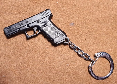 Vintage porte clé pistolet - porte,