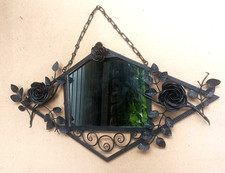 Important miroir mural en fer