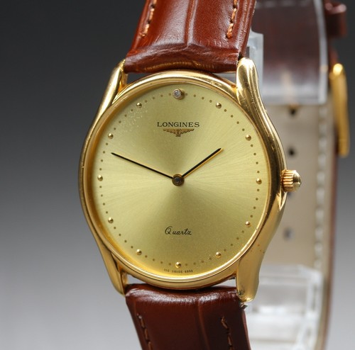 Montre quartz vintage - à,