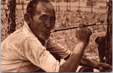 CHINA - a pipe smoker