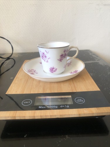 Ancien tasse sous tasse