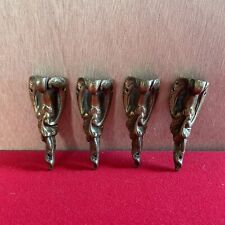 Lot of 4 small metal furniture foot ornaments 