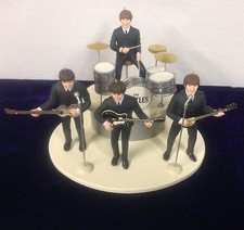 BEATLES ED SULLIVAN FIGURE SET OF 4 WITH INSTRUMENTS ON STAGE NEW IN BOX 1994