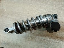 UN AMORTISSEUR ARRIERE 5VY