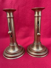 Paire de Bougeoirs à Poussoir