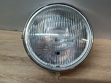 UN FEU PHARE OPTIQUE AVANT