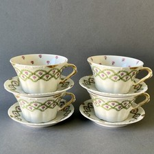 4 tasses anciennes signées