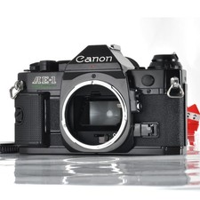 Appareil photo reflex argentique 35 mm Canon AE-1 Program boîtier noir du...